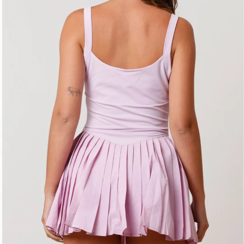 Fast & Flirty Sporty Pink Pleated Romper